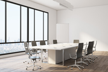 Contemporary meeting room with presentation board.