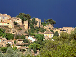 View of old traditional French small Provencal village Bonnieux in sunny day with clear blue sky.