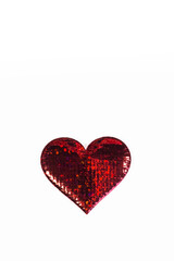 A shiny red heart isolated on a white background. Valentine's Day.
