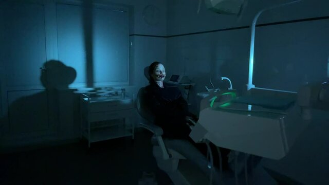 Woman in image of mutant visits modern dental clinic.