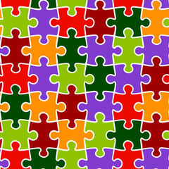 Vector background seamless pattern of multicolored puzzles.