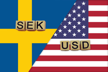 Sweden and USA currencies codes on national flags background