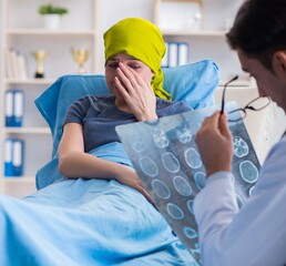 Cancer patient visiting doctor for medical consultation in clini