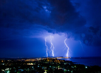 Fototapeta na wymiar Thunder and lightning over Calonge Spain