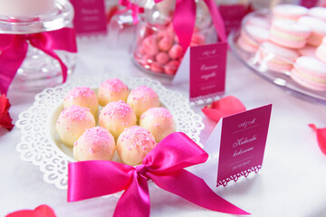 Tasty coconut pralines on a wedding candy bar