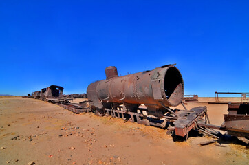 Fototapeta na wymiar The train cemetery, Salar de Uyuni or salt desert of Uyuni, Bolivia, South America