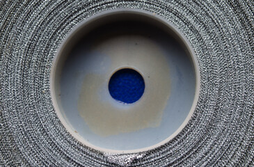 silver metallic cloth ribbon roll background