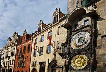 The glockenspiel and colorful buildings of Prague Old Town square