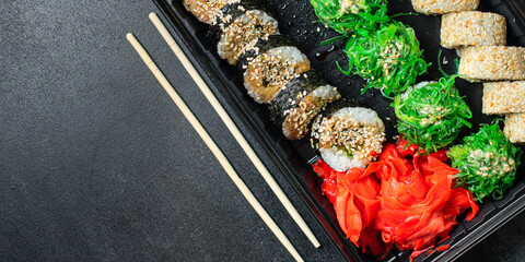 sushi rolls set salmon, rice, nori wakame tobiko caviar fresh snack on the table meal snack ingredient top view copy space for text food background rustic image