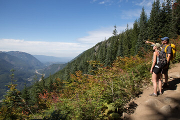 Father and Daughter Hiking in the Cascade Mountains in Washington State © Athena Images