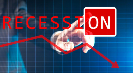 Start of the recession. The finger presses the IT button in the word Recession. The beginning of...