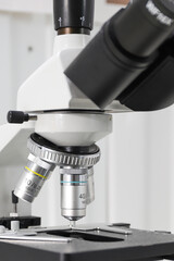 revolver system of biological microscope lenses in the laboratory