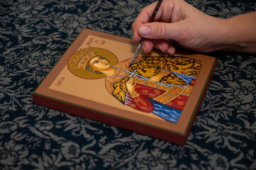Hand painted orthodox icon during painting on piece of wood. St. Catherine. Catherine from Alexandria. 