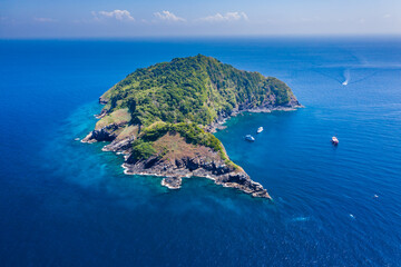 Aerial drone view of boats around Ko Bon island in Thailand's Similan Islands.