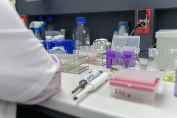 Fototapeta premium Chemists mixed up chemical to find antiretroviral drugs at the lab,Experiment to detect virus was found in the blood,Developers of potential medicines and vaccines against COVID-19