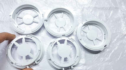 white medical plastic  parts in industrial factories.