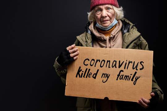 Homeless Woman Has No Family Due To Coronavirus, She Needs Help And Food Donation, Isolated On Black Background