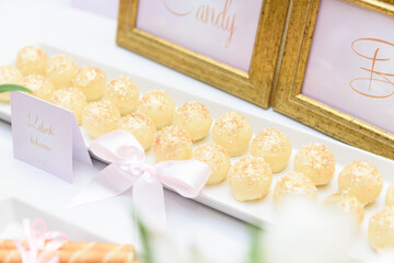 Coconut pralines on a sweet table at the wedding party