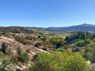 Naklejka premium Valley and mountain view with blue sky in San Diego, California. USA
