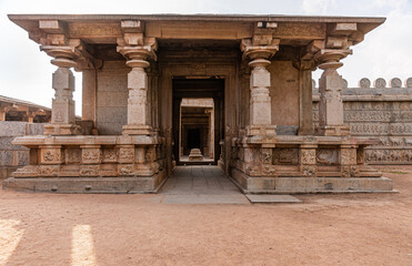 Hampi, Karnataka, India - November 4, 2013: Hazara Rama Temple. Closeup of brown stone mandapam in...
