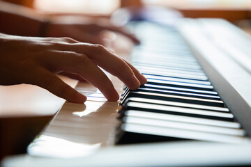 Close up of woman hands playing the piano, The Pianist playing
