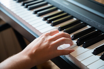 Obraz premium Close up of woman hands playing the piano, The Pianist playing