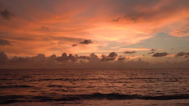 SERIES Red orange sunset sky orange video 4k cloud Red orange cloudscape time lapse background Dark red purple sunset sky cloud time lapse 4k evening clouds moving away rolling Phuket Thailnad.