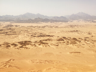 Fototapeta na wymiar Desert view from the airplane