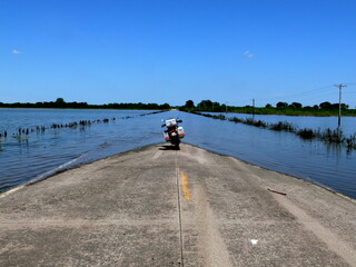 Motorcycle on flooded road