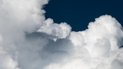 Mountainous Cumulus Clouds Boiling in the Summer Sky