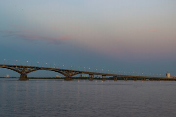 Bridge over the Volga river in the city of Saratov at sunset.