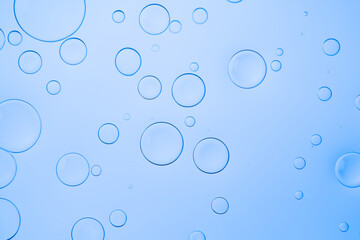 Water background with bubbles for website, advertising cosmetics and other product. Colorful abstract backdrop with bright gradients on blobs. Blue overflowing color