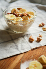 Overnight oats in bowl. Healthy breakfast. Low sugar diet. Vertical orientation 