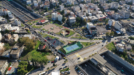 Aerial drone photo of Attiki odos popular toll road motorway passing through Athens area of Metamorfosi next to National road, Attica, Greece