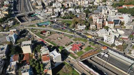 Aerial drone photo of Attiki odos popular toll road motorway passing through Athens area of Metamorfosi next to National road, Attica, Greece