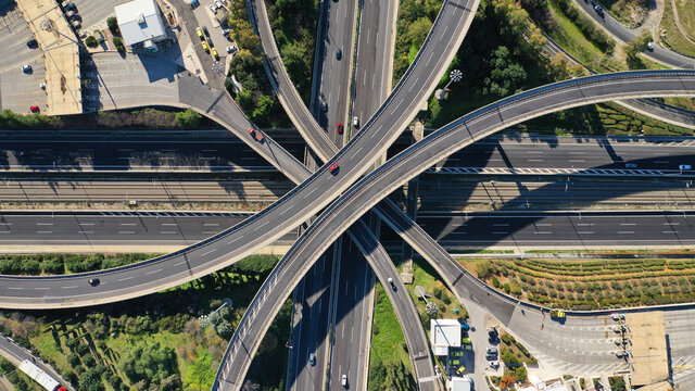 Aerial drone photo of multilevel junction national road crossing urban Metropolitan area