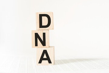 wooden cubes with text DNA . the medicine. medical concept