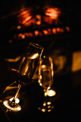 Celebration.Glasses of wine. The concept of Valentine's Day. Bokeh in the background of glasses are shaped like heart.