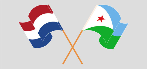 Crossed and waving flags of the Netherlands and Djibouti