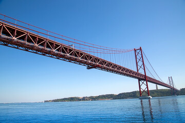 Fototapeta na wymiar Lisbon, Landmark suspension 25 of April bridge.