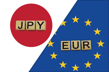Japan and Europe currencies codes on national flags background