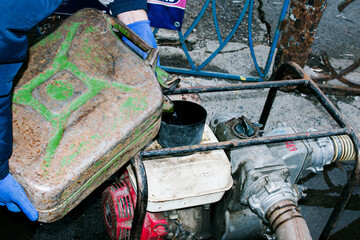 Flood pumping system. The pond in the park overflowed its banks. The municipal authorities...