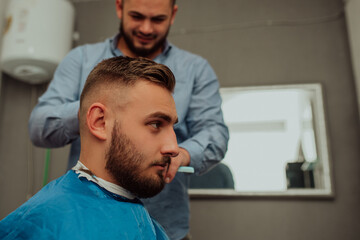 Fototapeta premium Hipster client visiting barber shop 