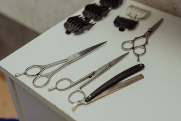 barber tools on white table 