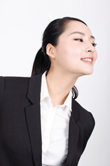 A young business woman in a suit