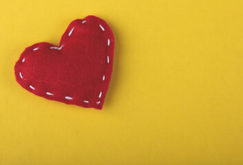 Red hearts on yellow background.