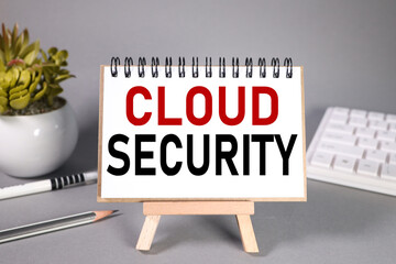 cloud security, text on white paper on gray background on stand
