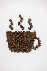 a cup made of coffee beans on a white backgrund