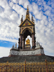 Fototapeta premium The Albert Memorial against blue sky in Kensington Gardens, London. 