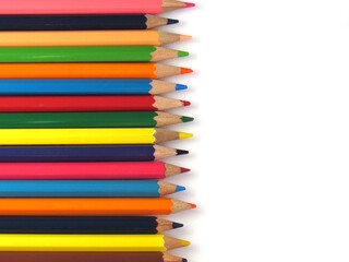 Bright colored pencils on a white background.